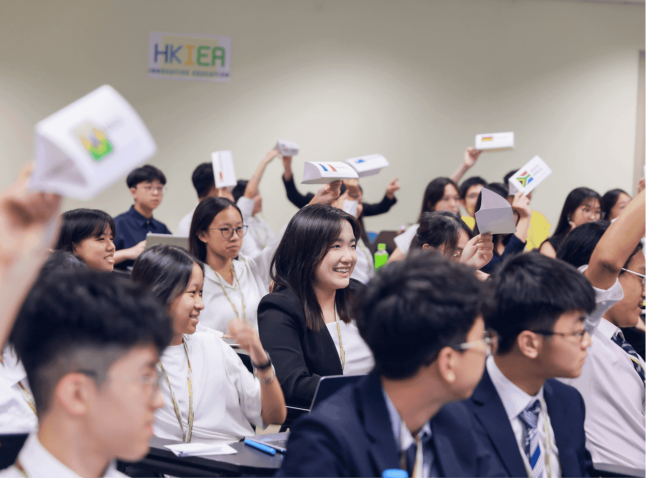 Students raising hands